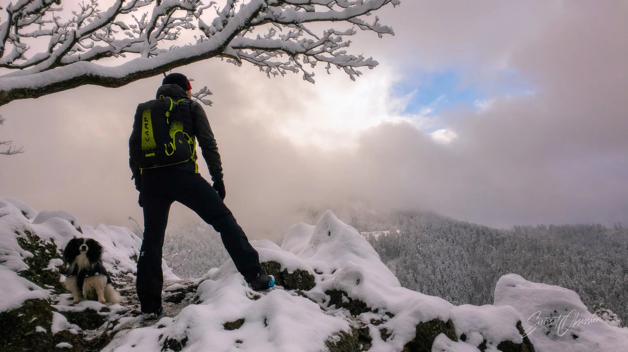 Watching the view at the top of Carlsruher Grat