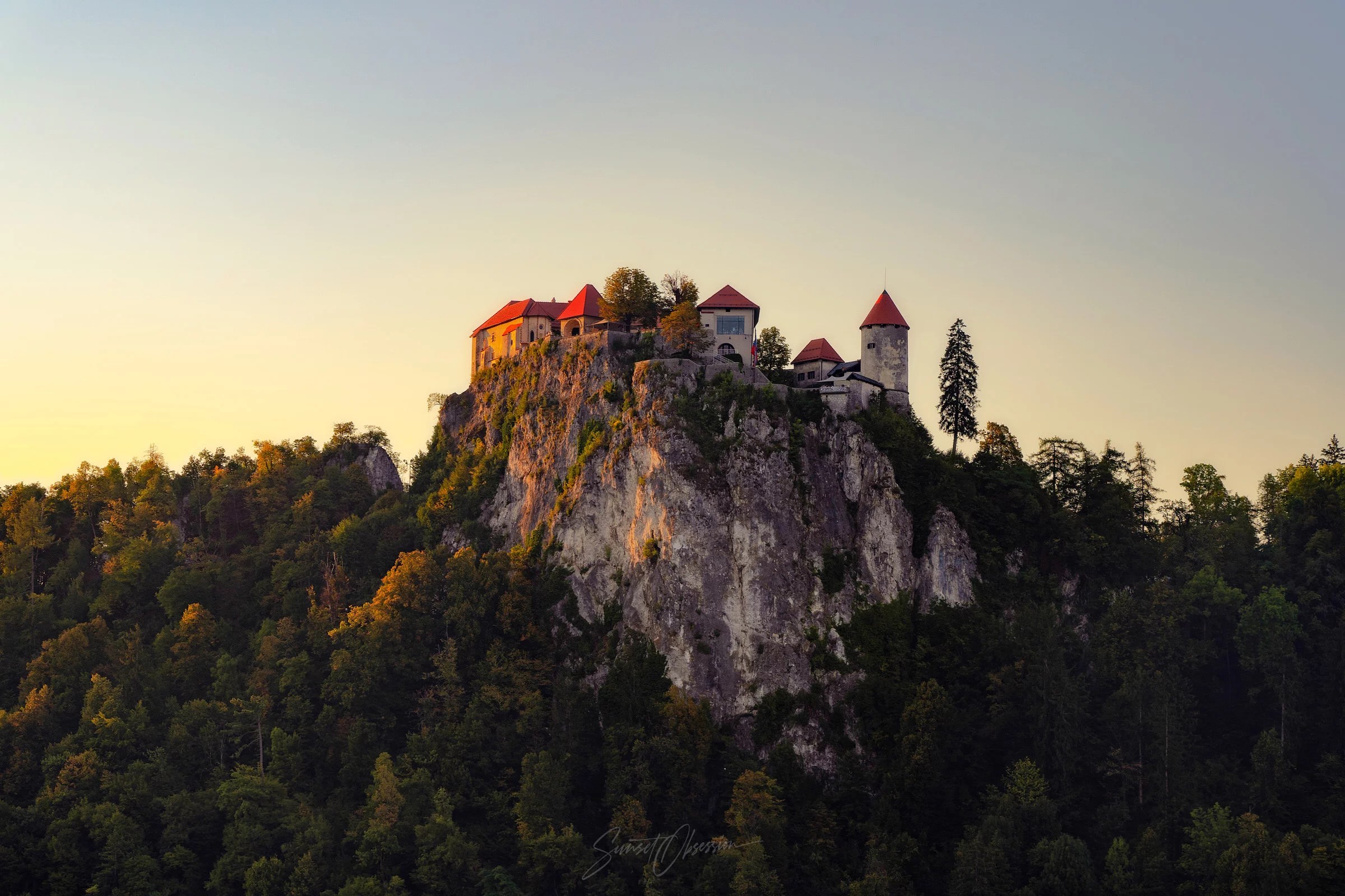 Bled Castle on lake Bled in Slovenia during sunset
