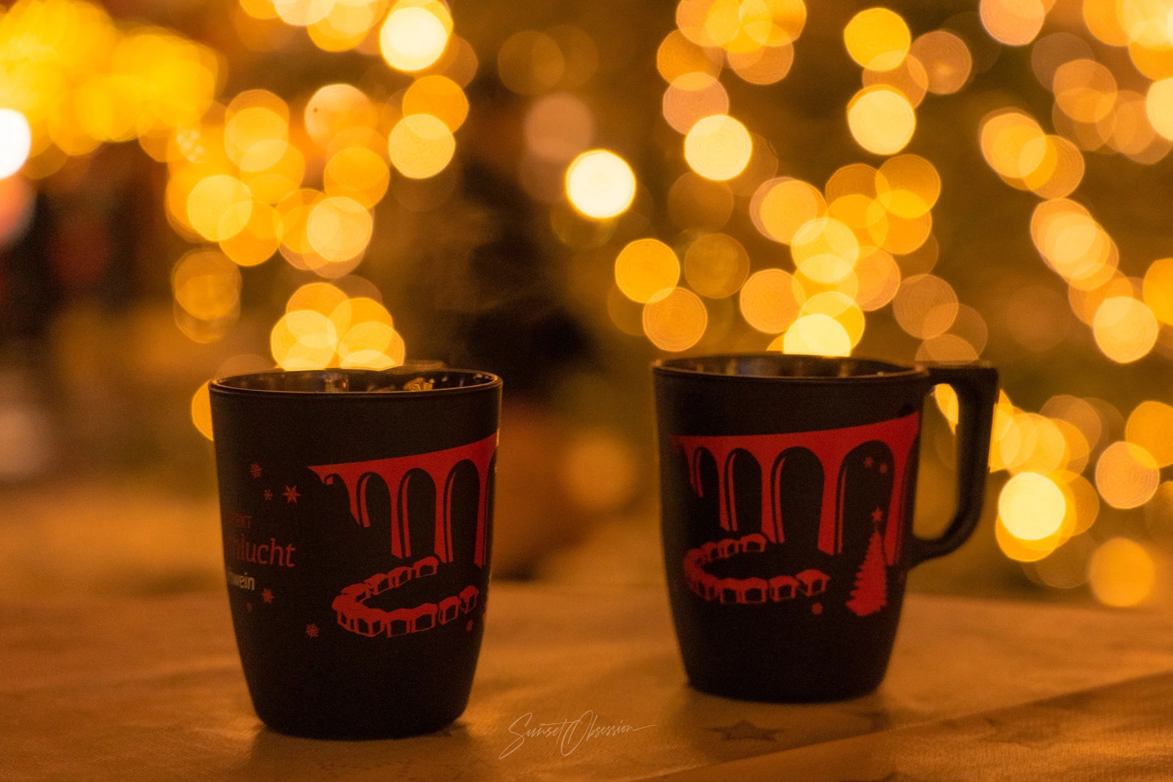 Christmas mugs filled with hot mulled wine