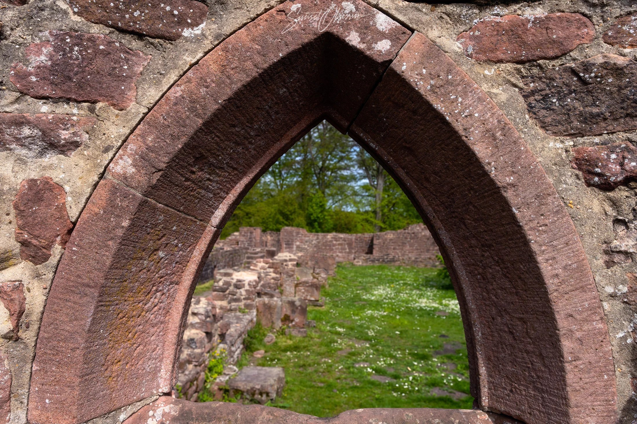 An old window in the St. Michael monastery ruins on top of Heiligenberg near Heidelberg