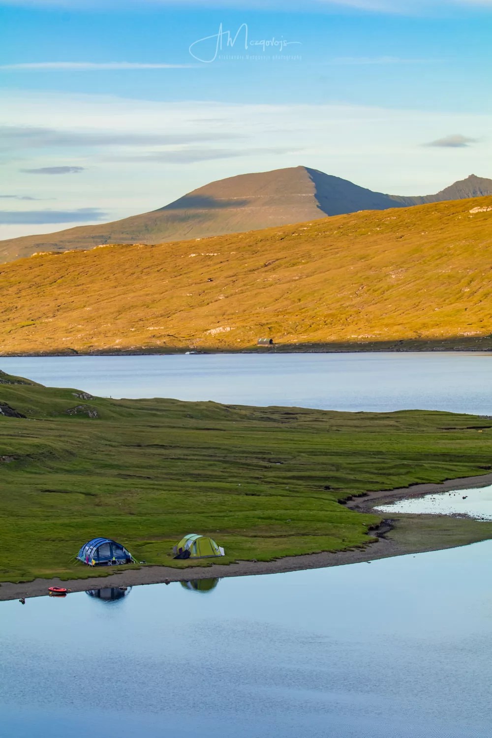 Tents near the lake of Sorvatsvatn (Leitisvatn) on the island of Vagar, Faroe Islands