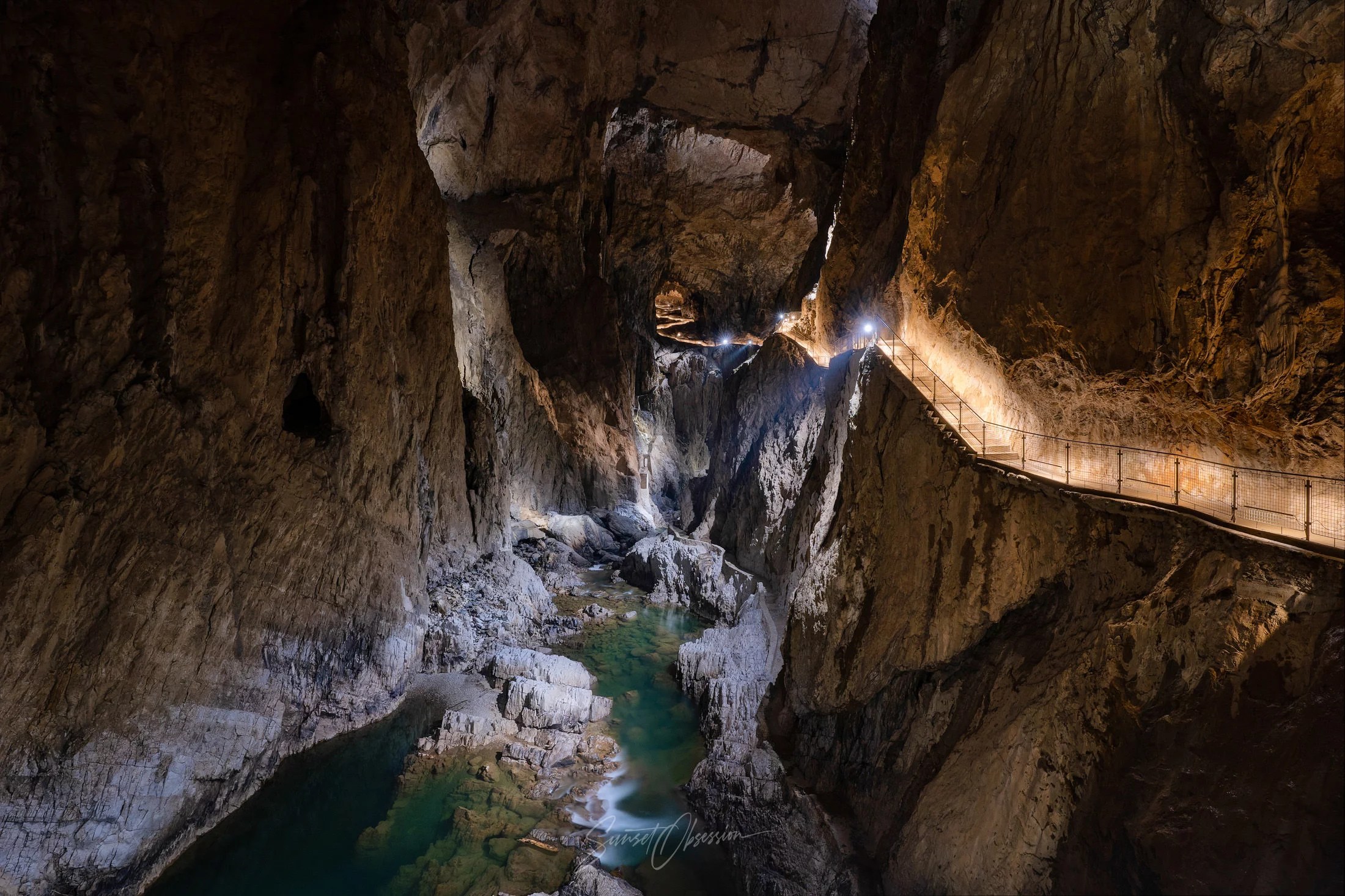 The Reka river carving its way through the underground canyon in Škocjan Caves