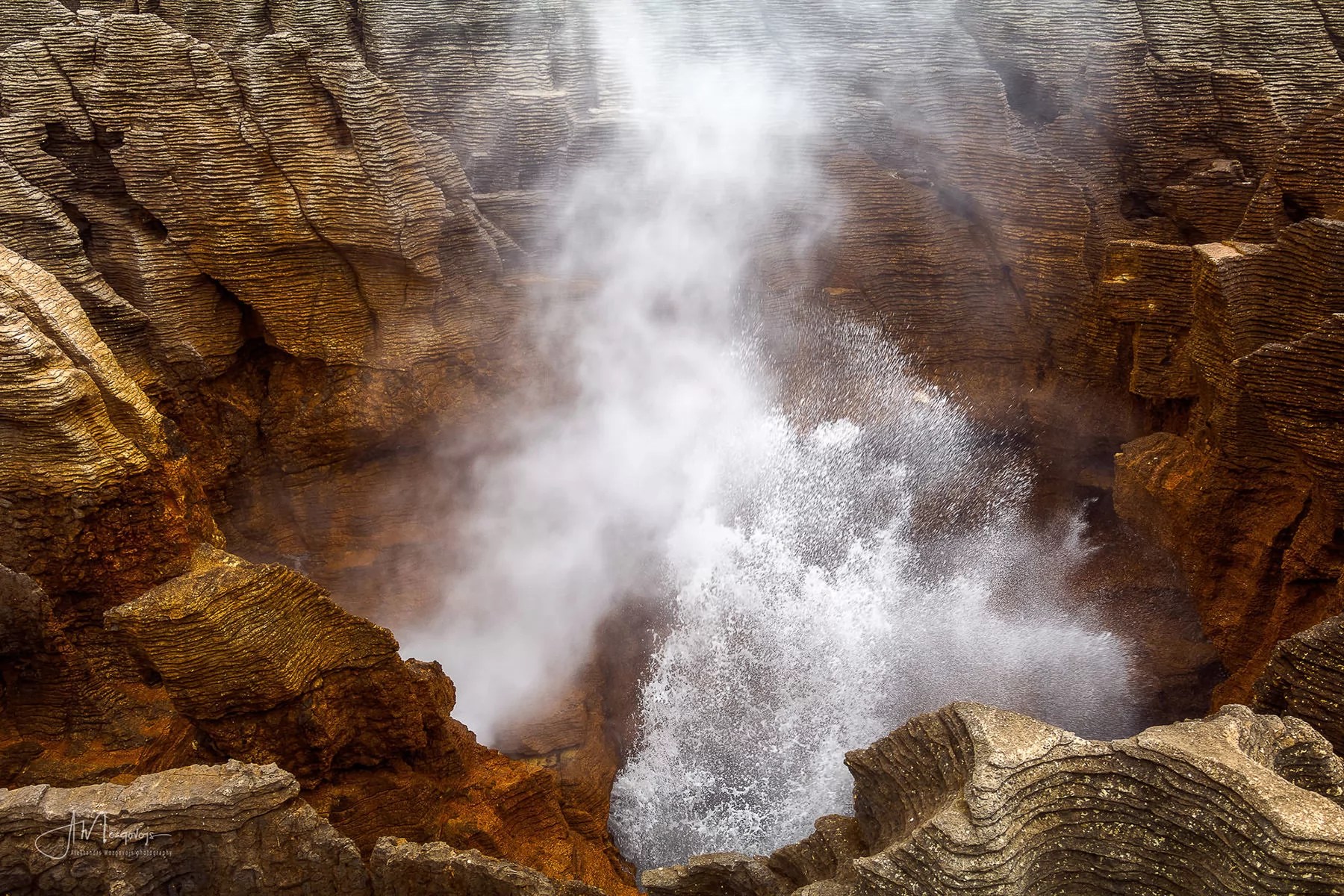 Ocean water explosion at Punakaiki Rocks